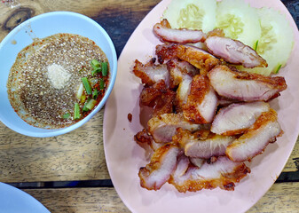 Grilled Pork Jowl with Thai Spicy Dipping Sauce. Top View Image.