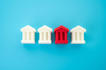 Red bank building among others. Financial problems, low liquidity. Financial crimes and money laundering. Money laundering. Institutional failure in the banking sector.