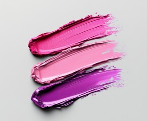 Pink purple lip gloss palette, stain swatch, on grey background