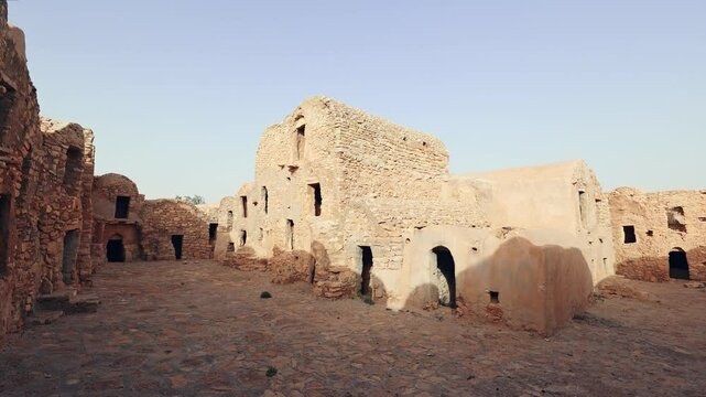 Ruins of multistory ghorfas of Fortified Berber settlement Ksar al-Dagaghra, Tataouine, Tunisia