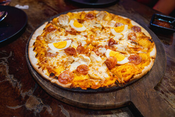 Pizza [Cambodia style] with boiled eggs and Chinese sausage