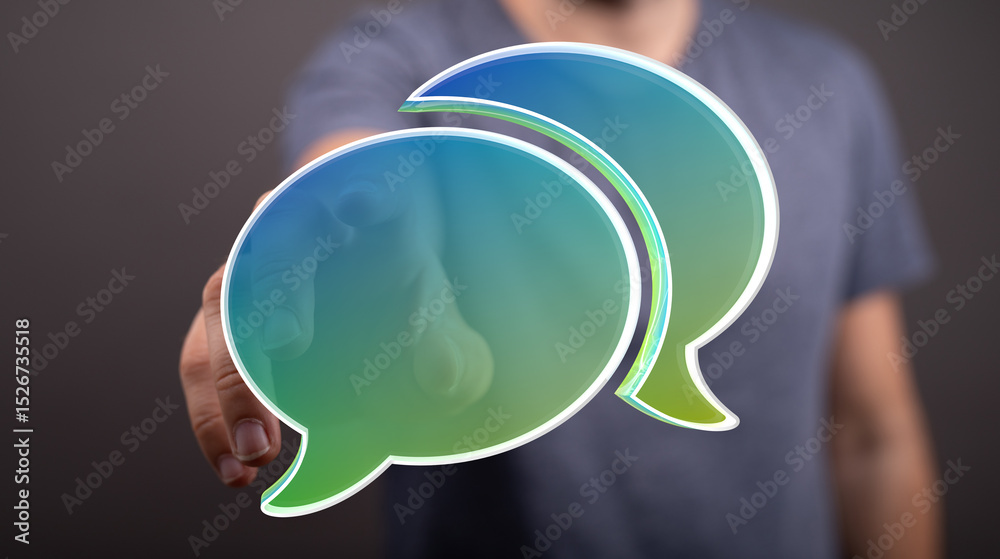 Poster Abstract image of a person holding digital speech bubbles, symbolizing communication, conversation, and connection.