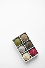 Assorted healthy, handmade vegan candies, sugar-free and lactose-free, flat lay.