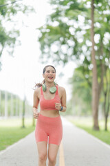 Fototapeta premium Woman Jogging in Park