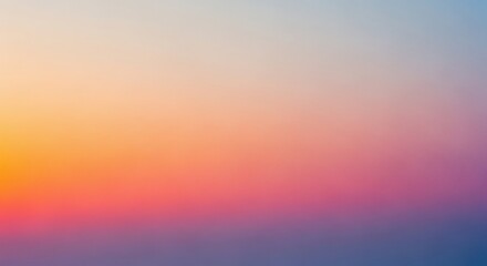 Soft, blended colors of a blurred sunset or sunrise.