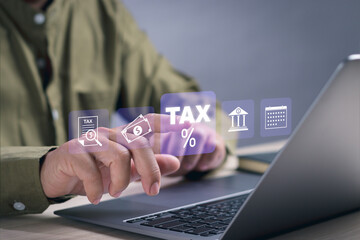 Finance or income and tax calculation online concept, man tapping on virtual screen of computer...
