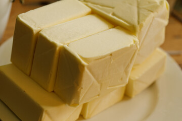 High-quality image of fresh butter blocks, perfect for food blogs, culinary websites, and cooking-related projects.