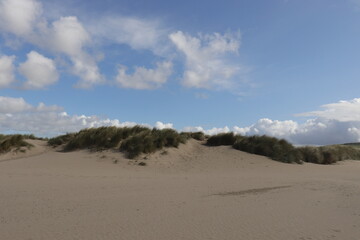sand dunes and clouds
