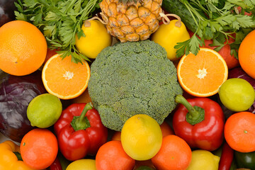 Assorted fresh ripe fruits and vegetables.