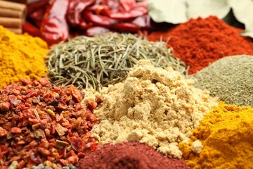 Different aromatic spices as background, closeup view