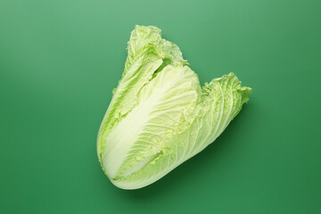Fresh Chinese cabbage on green background, top view