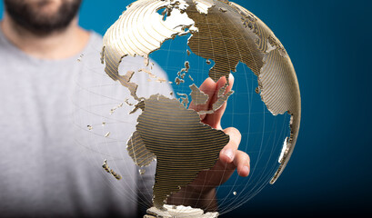 High-quality stock photo of a person interacting with a digital globe, representing global...