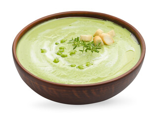 Tasty pea cream soup with croutons and thyme isolated on white