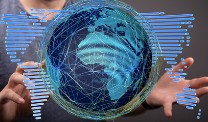 Person interacting with a holographic globe, showcasing global network connections and digital...