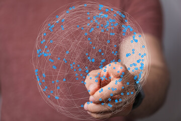 Abstract image of a hand interacting with a global network, representing connection and technology.