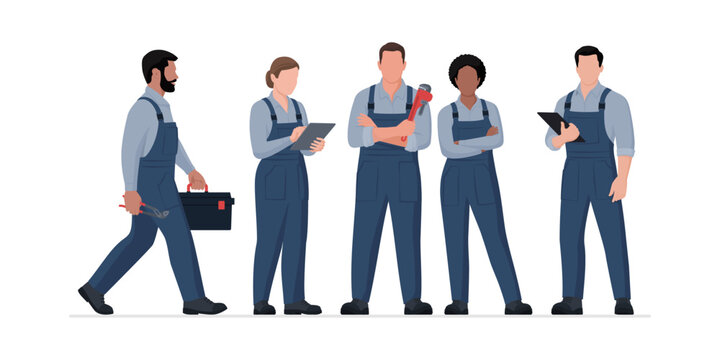 Professional plumbers and engineers standing together