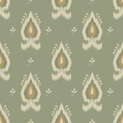 Ikat textile pattern in sage green and cream tones. Ethnic boho fabric, seamless design, decorative vintage tribal ornament for print and home decor.
