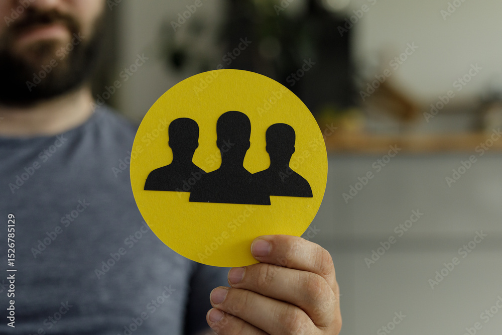 Poster image of a person holding a symbol representing teamwork and collaboration.