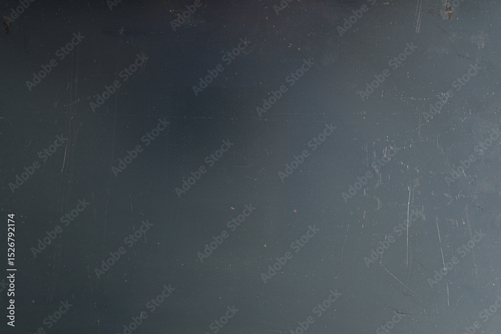 Poster High-resolution image of a dark gray metallic surface with scratches. Perfect for backgrounds and textures.