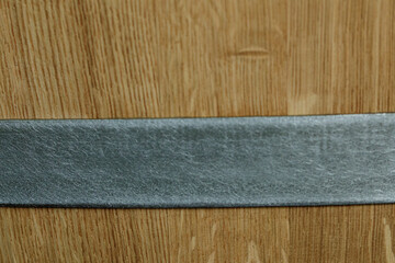 High-resolution image of wood texture with a gray band. Ideal for backgrounds, websites, and design projects.
