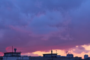 Kyiv Skyline at Colorful Sunset with Construction Cranes