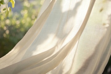 Breezy sheer curtain dances in the wind, adding charm to a sunlit garden, Light breezy sheer curtain blowing in the wind with garden behind it