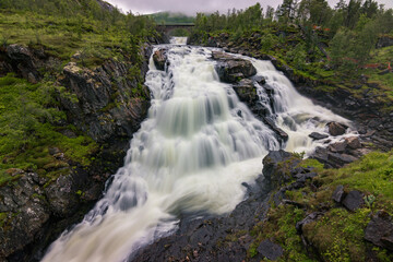 Majestic waterfall of Vøringfossen in a foggy day (Norway)
