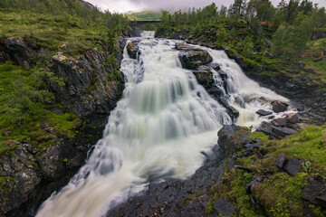 Majestic waterfall of Vøringfossen in a foggy day (Norway)