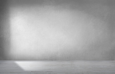 Gray wall in an empty room with concrete floor