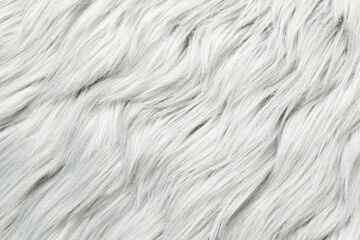 Texture of white furry fabric as background, closeup