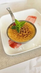 Creme brulee dessert served at restaurant traditional french dessert