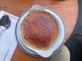 Creme brulee dessert served at restaurant traditional french dessert
