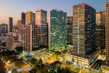 Skyline of Rio de Janeiro City Downtown With Office Buildings in the Evening and Carioca Square Below