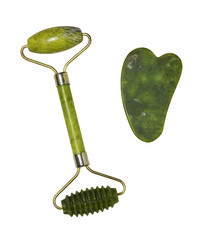 Face care set with gua sha and face roller isolated on white or transparent background
