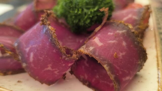 thinly sliced ​​basturma. delicious food concept