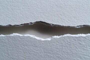 Torn paper reveals texture and raw edges. Abstract backdrop, rough material, handmade craft, creative art