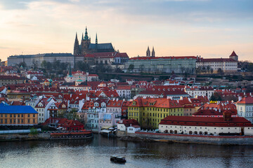 Obraz premium The Vltava River in the center of the Prague, Czech Republic, on a cloudy spring day 