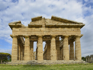 Fototapeta premium Second Temple of Hera in Paestum, Greek temple of Magna Graecia, the ruins of the ancient city of Paestum. UNESCO World Heritage Site, municipality of Capaccio, province of Salerno, Italy
