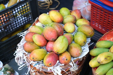 Fresh Ripe Mangoes at Market Display for sell 