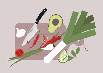 A sharp knife and various fruits and vegetables on a wooden cutting board