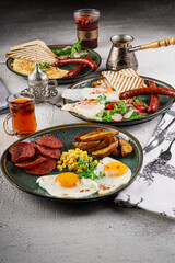 Eggs, Sausage and Tea on Rustic Table
