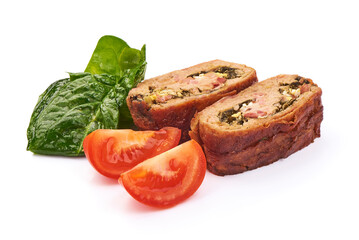 Sliced meatloaf stuffed with spinach, eggs, and ham, isolated on white background.