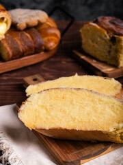 A delicious slice of buttered sweet bread, browned and generously coated with sugar