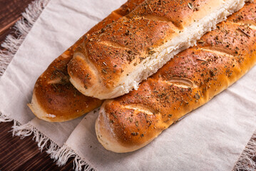 Artisan Herb-Crusted Bread on Rustic Wood