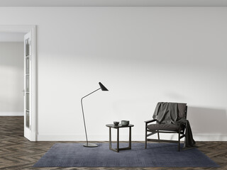 A cozy living room with a comfortable chair, lamp, table, and rug