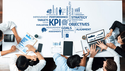 A dynamic business strategy meeting showcases collaborative efforts on KPI analysis, performance...