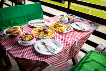 Traditional lunch on a mountain restaurant terrace