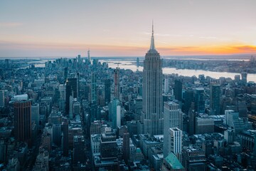 Fototapeta premium New York City skyline at sunset with Empire State Building