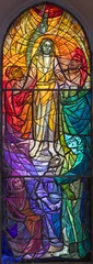 Fototapete FLORENCE, ITALY - MARCH 21, 2025: The Transfiguration of the Lord on the modern stained glass in the church Chiesa di San Francesco by P. Alberto Farina from year 1971. © Renáta Sedmáková