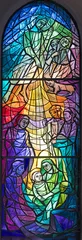 Fototapete FLORENCE, ITALY - MARCH 21, 2025: The modern Nativity on the stained glass in the church Chiesa di San Francesco by P. Alberto Farina from year 1971. © Renáta Sedmáková